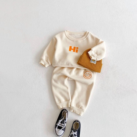 Baby-Set mit langärmeligem Kapuzenpullover - Smiley-Print und Hose Baumwolle